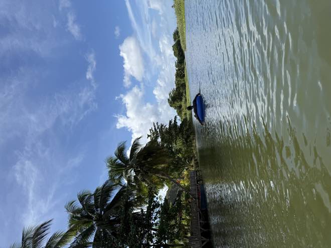 A guest pushing off from the dock at the launch point